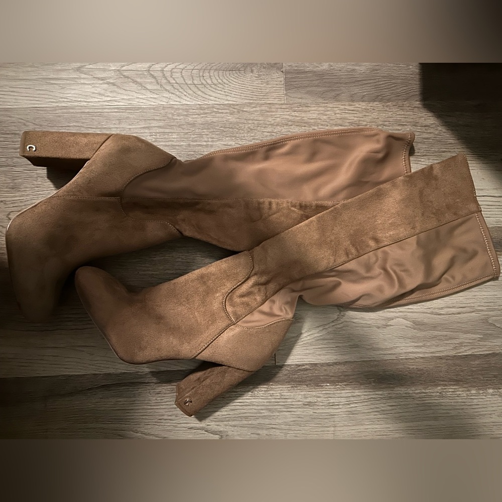 Over the calf heeled boots